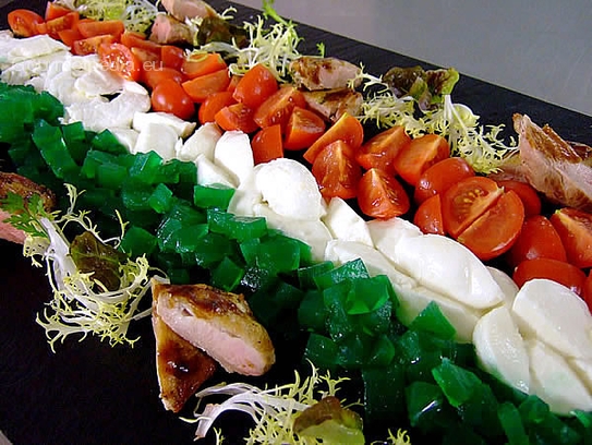 Tartare of tomato, mozzarella and basil on marinated endive and quail breast