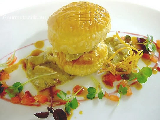Millefeuille with yellow boletus mushrooms sauce and diced tomato