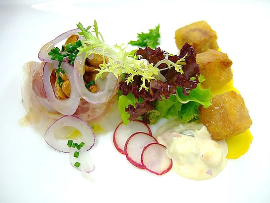 Variation of marinated and crispy calf’s head with remoulade sauce and potato salad