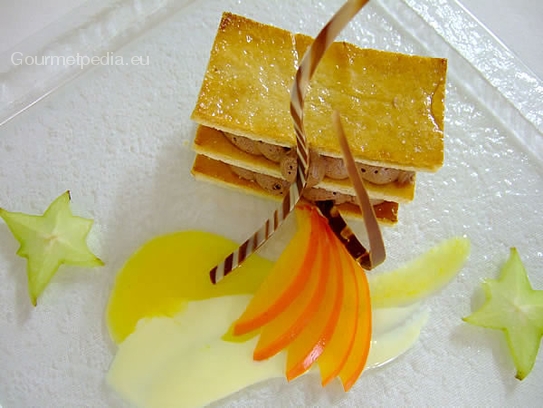 Caramelized millefeuille with plain chocolate mousse on persimmon sauce