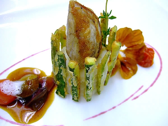 Breast of quail sauté on potatoes with courgette straws and Porto jus