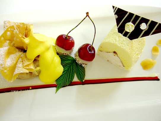 Sachet of strudel pastry stuffed with cherries and vanilla parfait