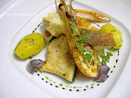 Grilled seafish on vegetables and boiled potatoes