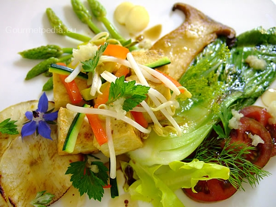 Pan seared tofu on pak-choi, wild asparagus, mushrooms and soy-bean sprouts