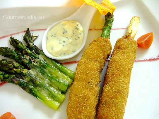 Fried asparagus in a meat coat with tartare sauce