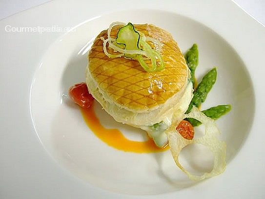 Millefeuille with asparagus sauce on tomato essence