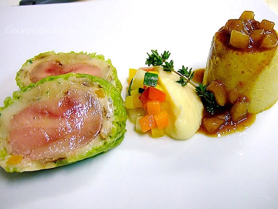 Pheasant breast in savoy cabbage and yellow bolletus mushrooms with baked apple sauce and chestnut pudding