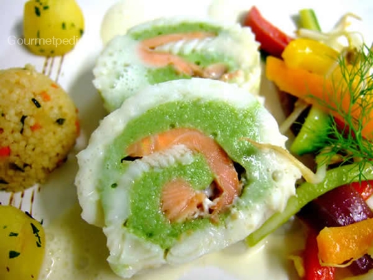 Plaice and fillet of salmon trout roll with vegetables and couscous