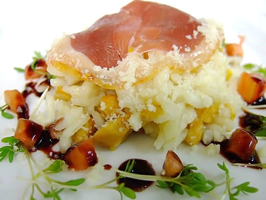 Arroz de rebozuelos frescos con pechuga de oca ahumada