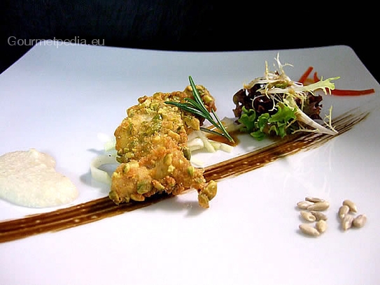 Guinea fowl fillet in pistaccio coat on marinated kohlrabi-apple salad with sunflower seeds cream