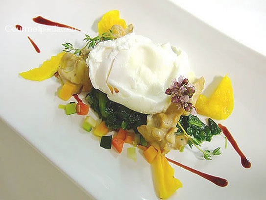 Poached egg on sauteed spinach and chanterelles