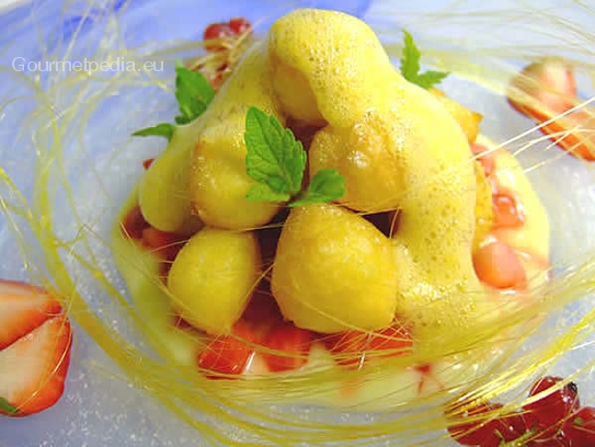 Syringe fritters with white wine and marsala sabayon and strawberries