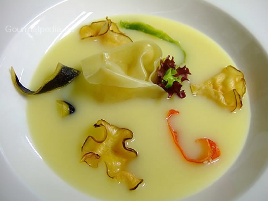 Cream of potato and leek soup with Brie-filled ravioli