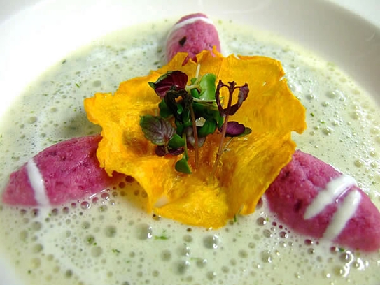 Fresh herb cream soup with beetroots quenelles