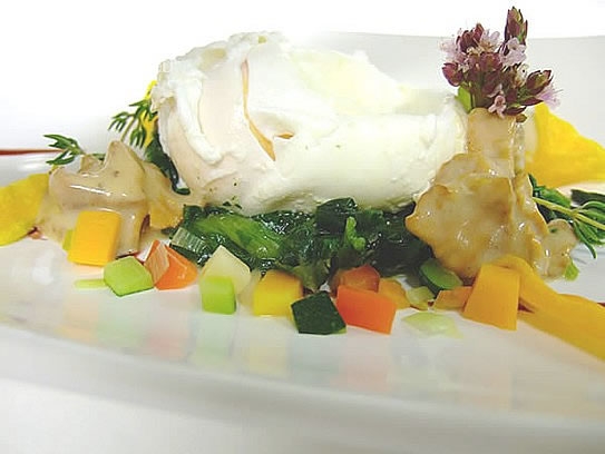Poached egg on sauteed spinach and chanterelles