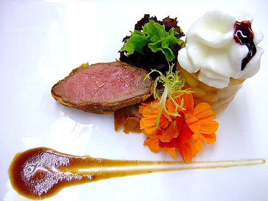 Fried fillet of hare in a crisp bread crust with potato foam