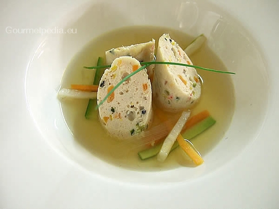 Beef consommé with roll of capon and vegetables julienne