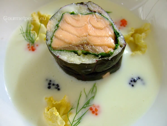 Cream of celery soup with salmon roulade in chards