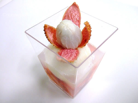 Refreshing litchi sorbet and strawberries with Prosecco