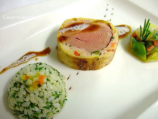 Fillet of veal in vegetables crêpes with herb rice and asparagus