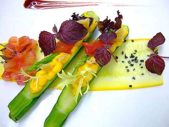 Baby courgettes filled with pumpkin cream served with Thai asparagus and tomato ragoût