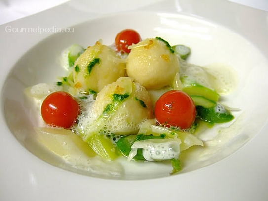 Potato gnocchi stuffed with gorgonzola on sauteed green and white asparagus