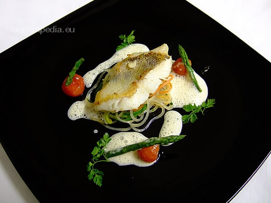 Grilled pike-perch fillet on Chinese noodles with vegetables and cherry tomatoes
