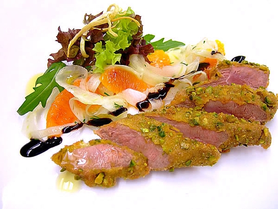 Fried duck fillet in pistachio nuts on marinated orange-fennel salad