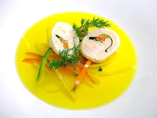 Safron and fennel essence with vegetables julienne and sole rolls