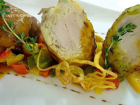 Variety of rabbit on sauteed peppers with duchesse potatoes