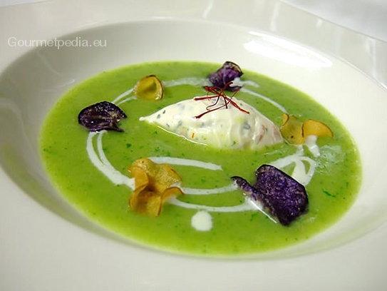 Cream of herb soup with fresh cheese quenelle